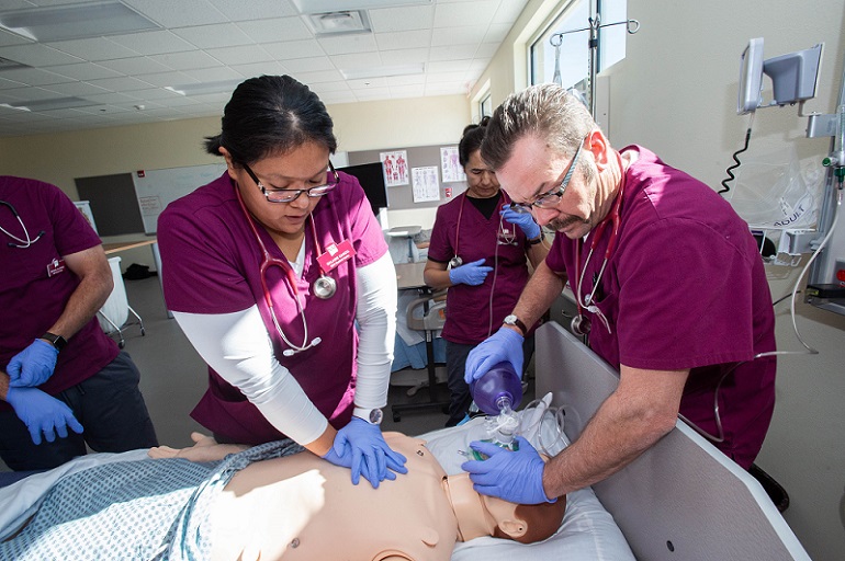 Nursing Student administering CPR